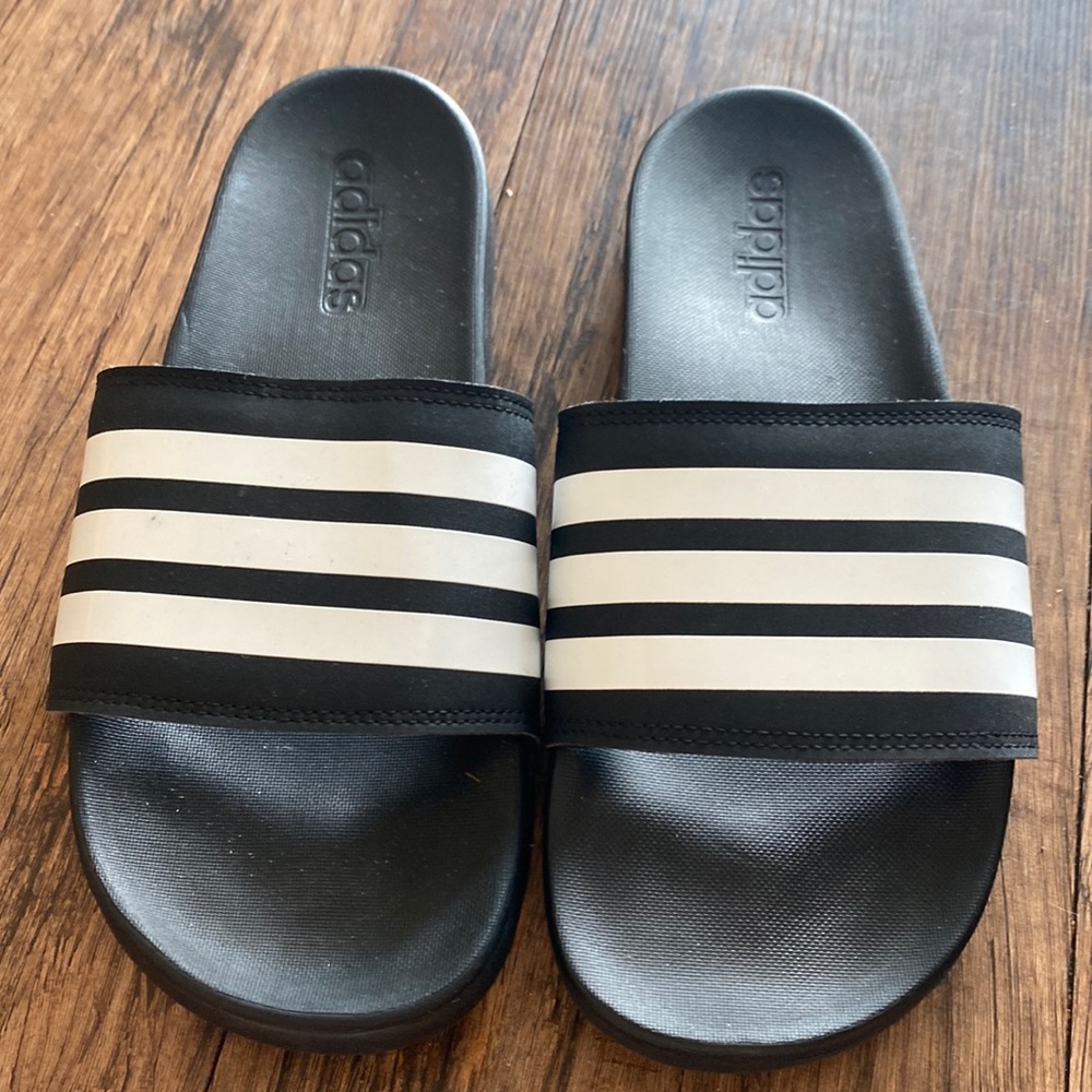 Adidas size 8 slides. Excellent condition never worn.